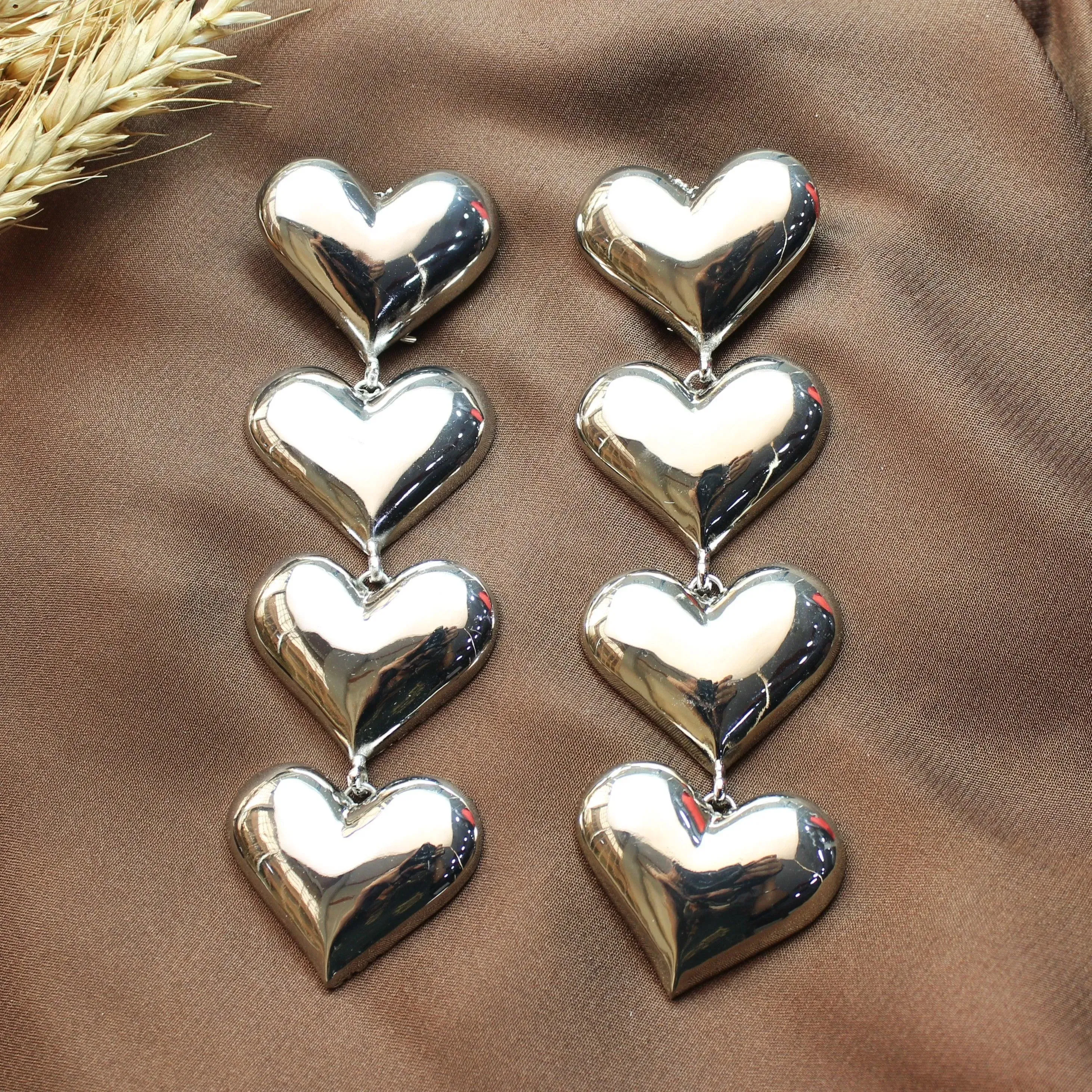 TFC Bold Heart String Silver Plated Dangler Earrings
